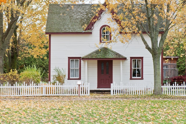 white house with a yard