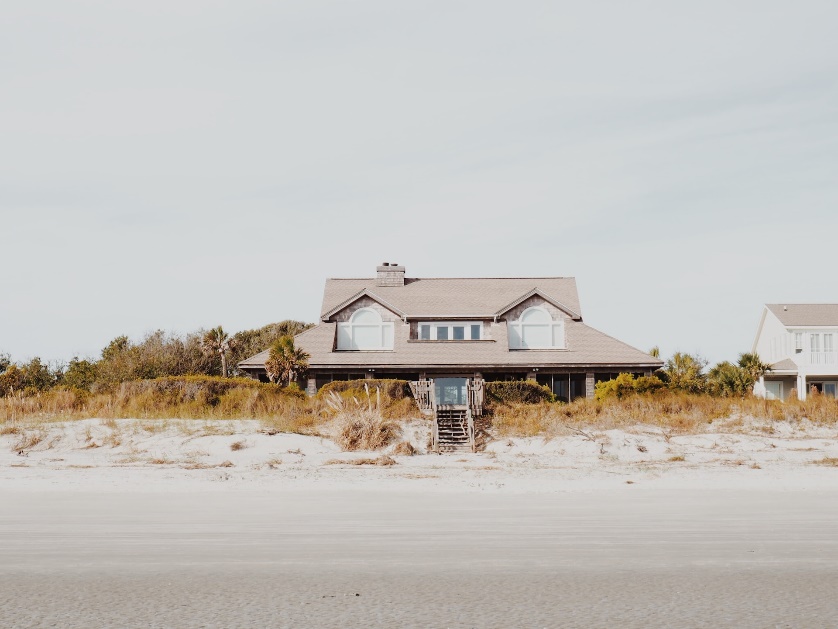 A small home exposed to sand