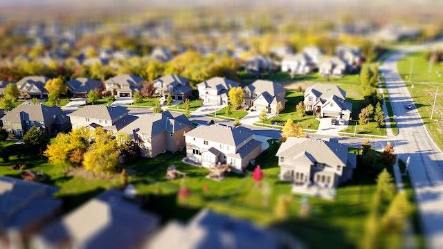 Photo of a suburban neighborhood with a similar house style.