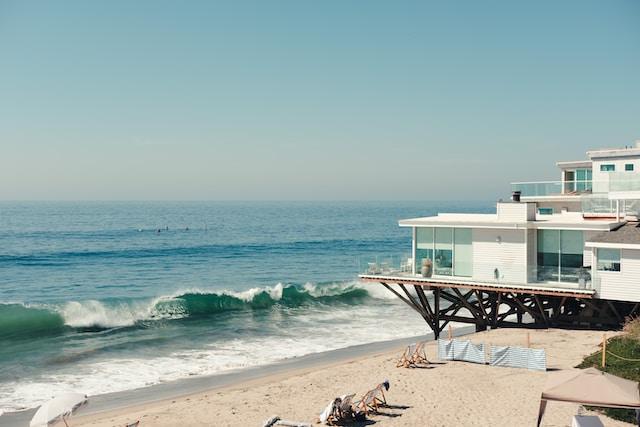 A large white house by the beach