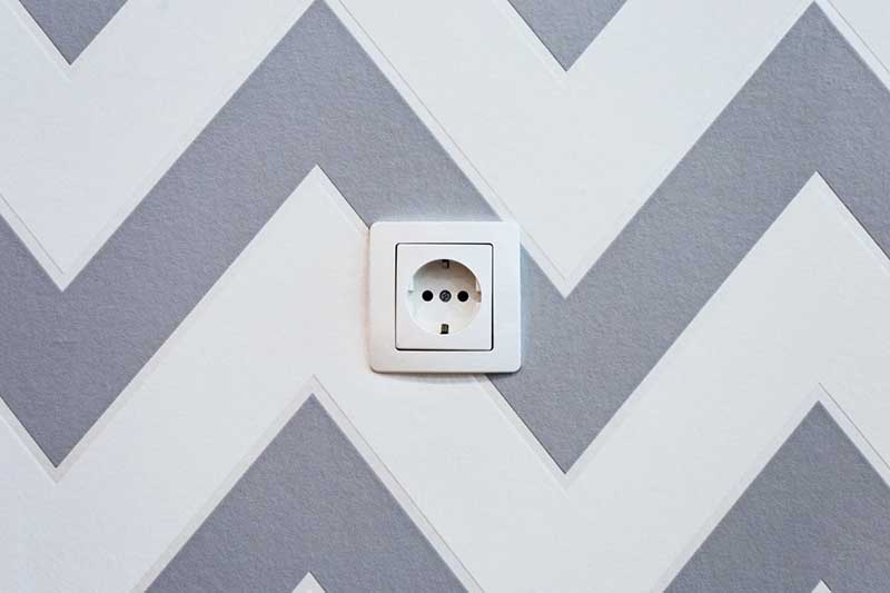 An electrical outlet on the wall.