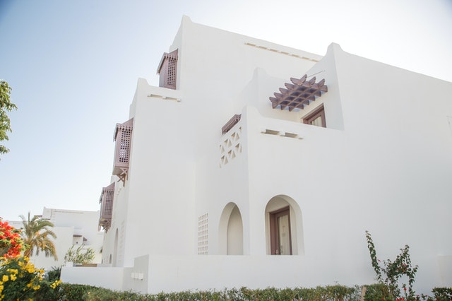 A white mansion symbolizing home additions in Florida