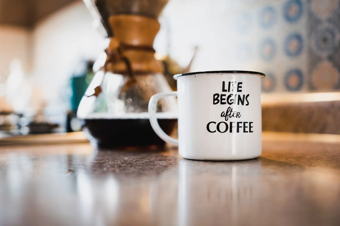 White and black printed coffee cup