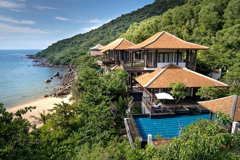 An oceanfront property with a swimming pool. 