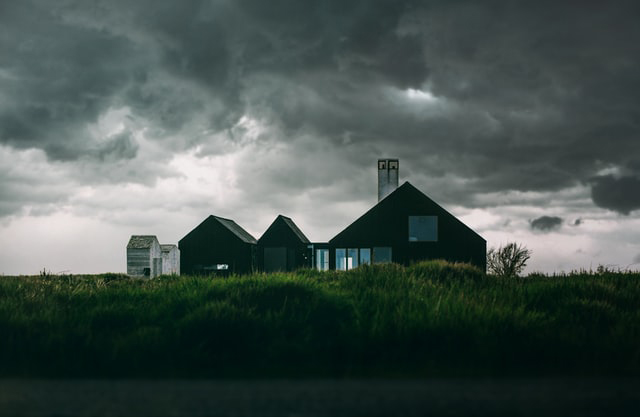 Dark clouds above a house