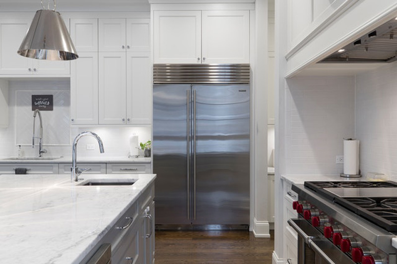 a marble countertop in a modern kitchen