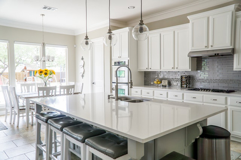 a kitchen with a kitchen island