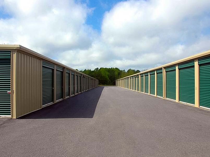 Multiple storage units with green doors